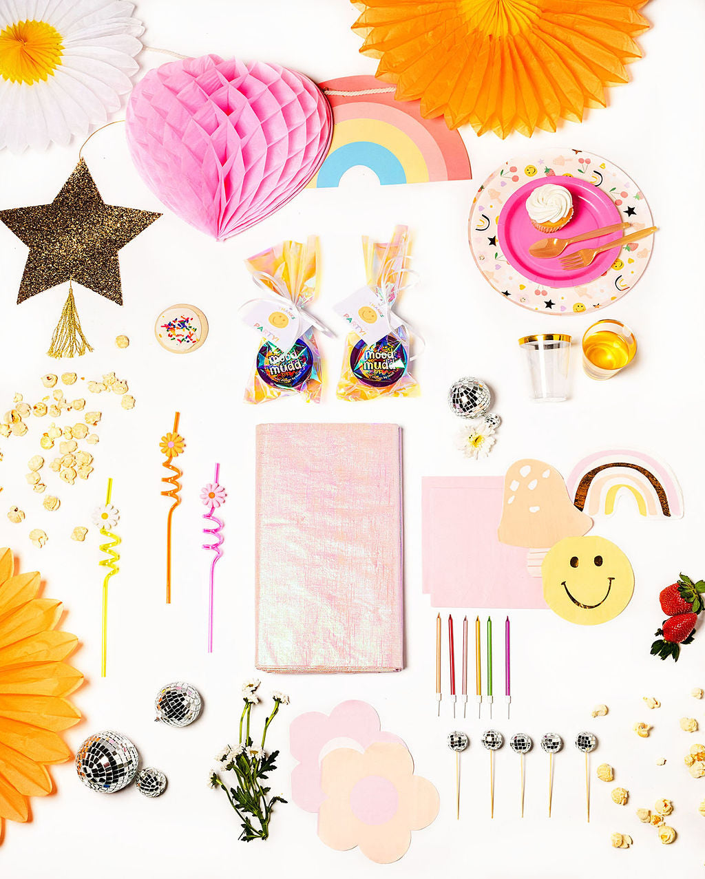 Groovy-themed birthday party pack with retro florals, rainbows, and vibrant tableware