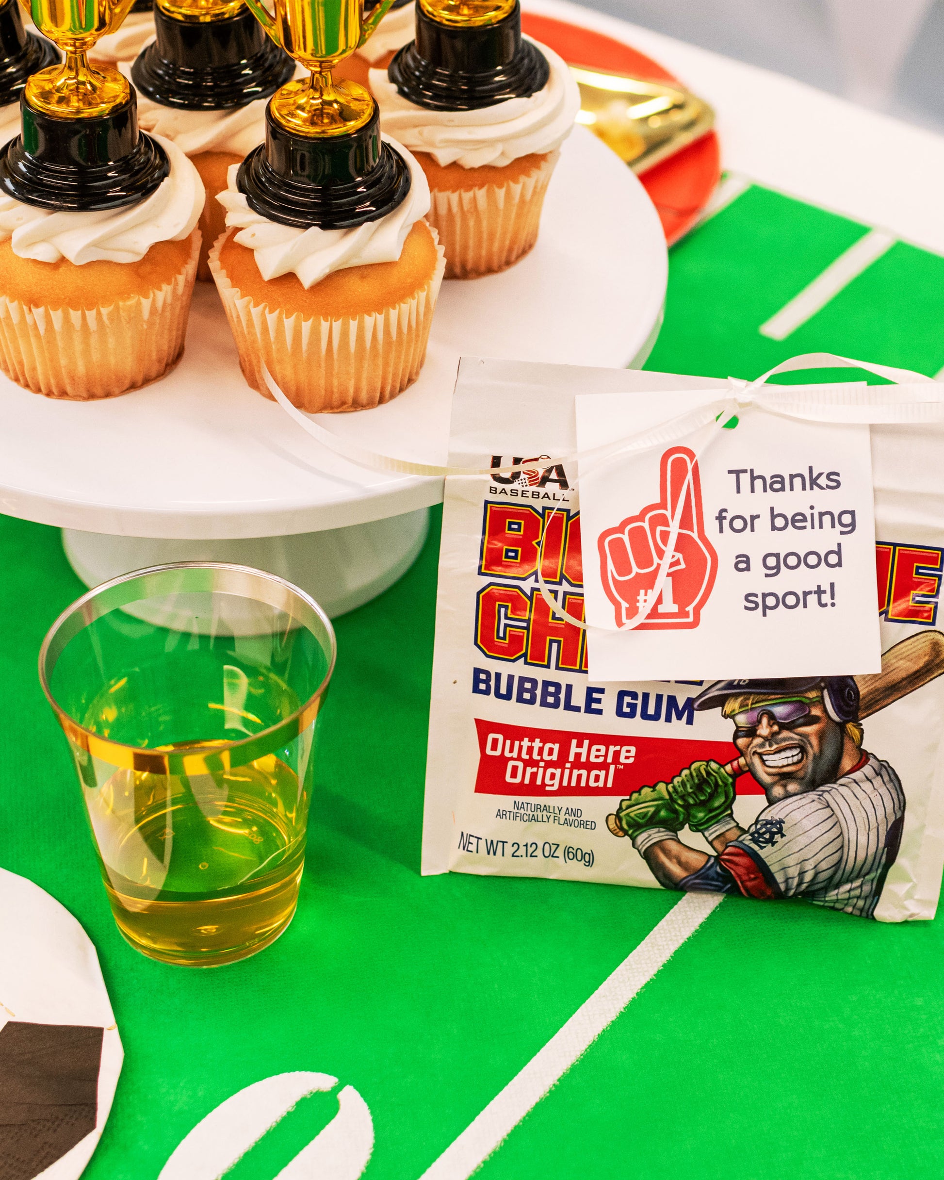 Good Sport Party Pack favors including whistles, medals, and sports-themed chewing gum for kids