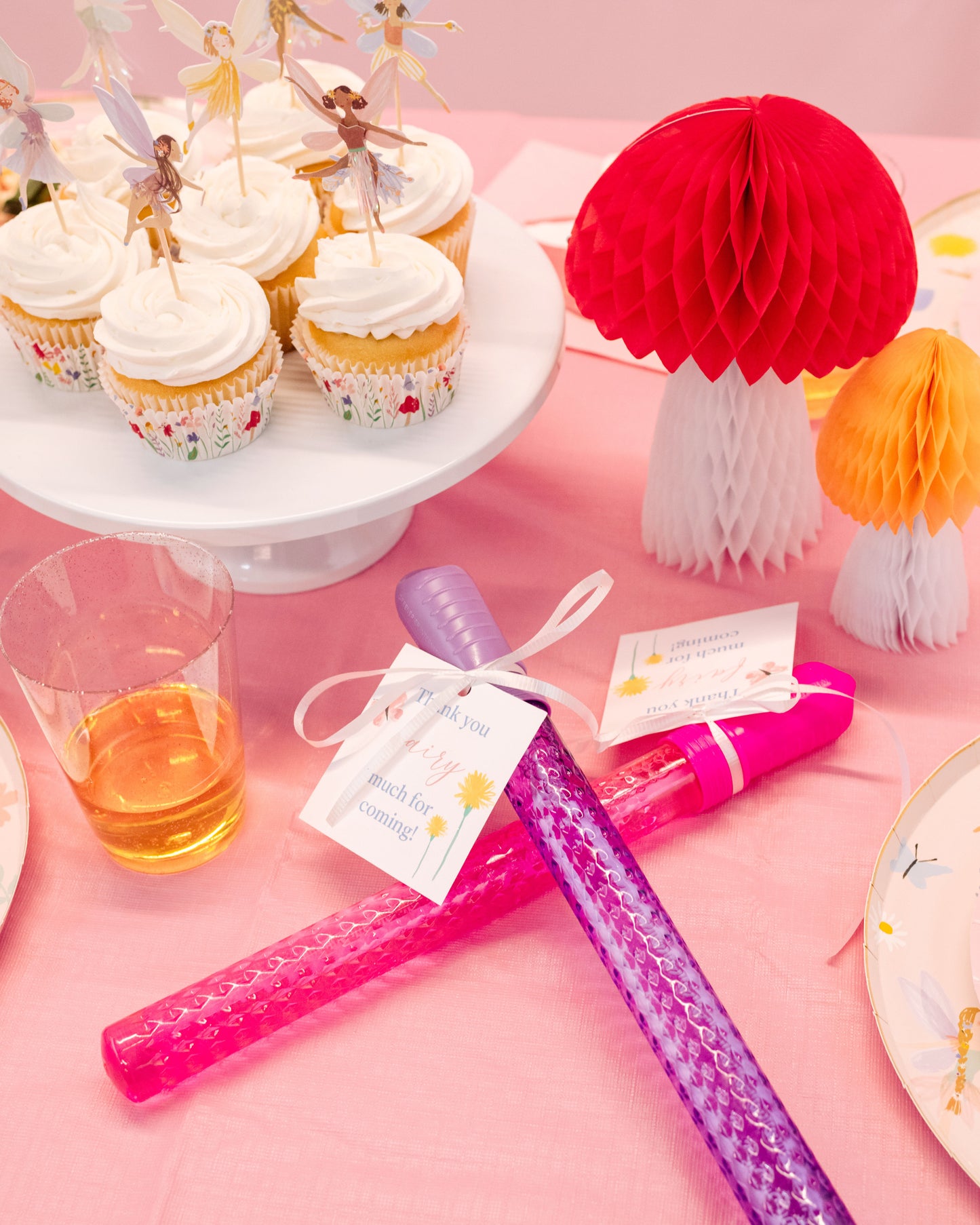 Fairy party favors including wings, and bubble wands for kids