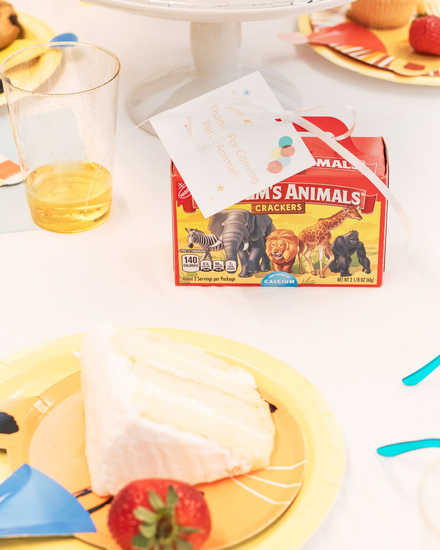 Star shaped party glasses and animal cracker boxes from the Party Animal kit